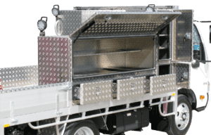 9- Alloy Checkerplate toolbox with seperate compartments and internal shelving and rubber matting
